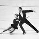 (Original Caption) 1/29/64-Innsbruck, Austria: Lumilla Belousova and Oleg Protopopov (Soviet Union) during their performance (she is dipping) in the Olympic pairs figure skating competition tonight in the Olympic Ice Stadium here. The Russian team won the Gold Medal with 104.4 points. The German team Marika Kilius and Hans-Jurgen Baummer placed second with 103.6 seconds.
